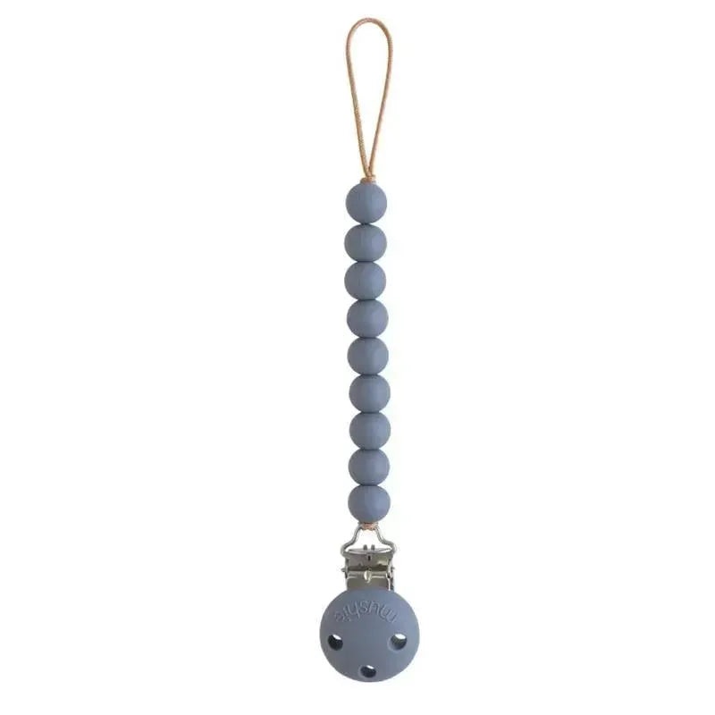 Mushie – Hera Silicone Pacifier Clip, Tradewinds