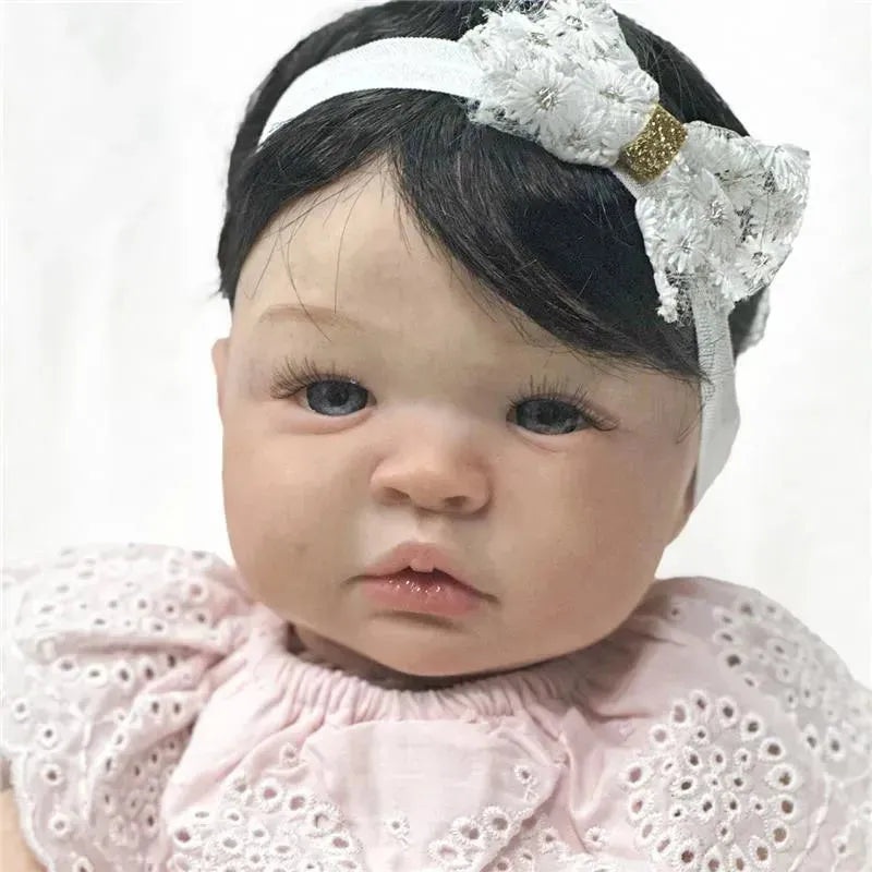Reborn Baby Doll – White Vinyl & Black Wig, Shyann