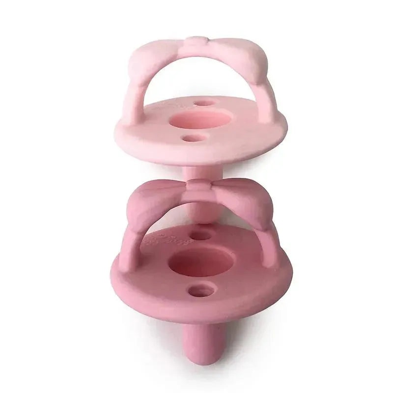 Itzy Ritzy – 2-Pack Silicone Pacifiers – Bow (Light Pink/Dark Pink)