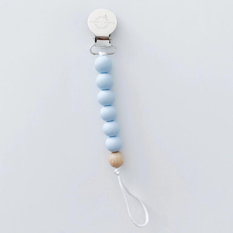 Sugar + Maple Pacifier + Teether Clip | Silicone with 1 Beechwood Bead Blue